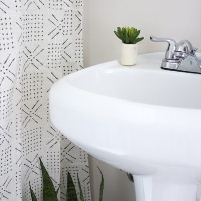 Ugly apartment bathroom solutions: From moldy caulk lines to ugly shower doors, here's one renters take on how to deal with an unsightly restroom.