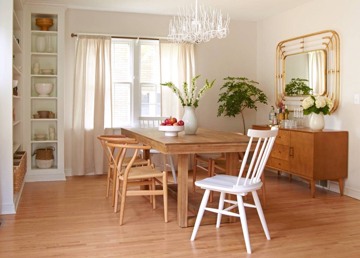 Curbly House dining room makeover - art deco mirror, buffet, wishbone chairs
