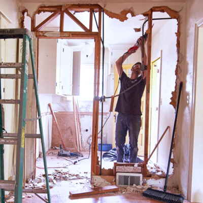 bruno demo-ing an interior wall