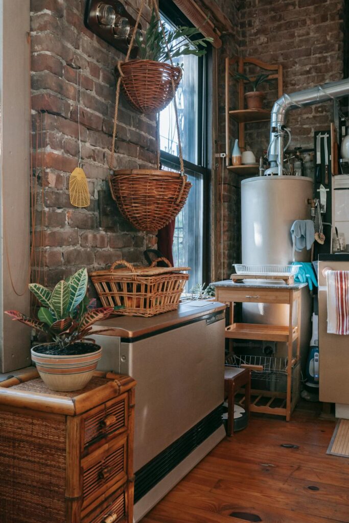 Charming rustic kitchen with exposed brick, vintage decor, and cozy furnishing for a warm ambiance.
